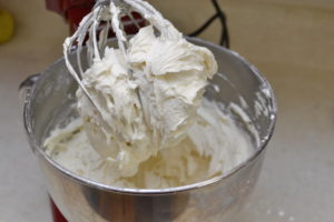 Salted butter and a small amount of cream cheese makes this the perfect buttercream frosting.