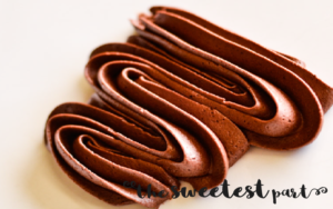 Many chocolate frosting recipes don't look or even taste like chocolate! But this rich homemade dark chocolate buttercream frosting recipe is the best!