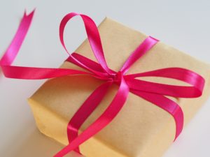 simply wrapped box with a silk ribbon and bow