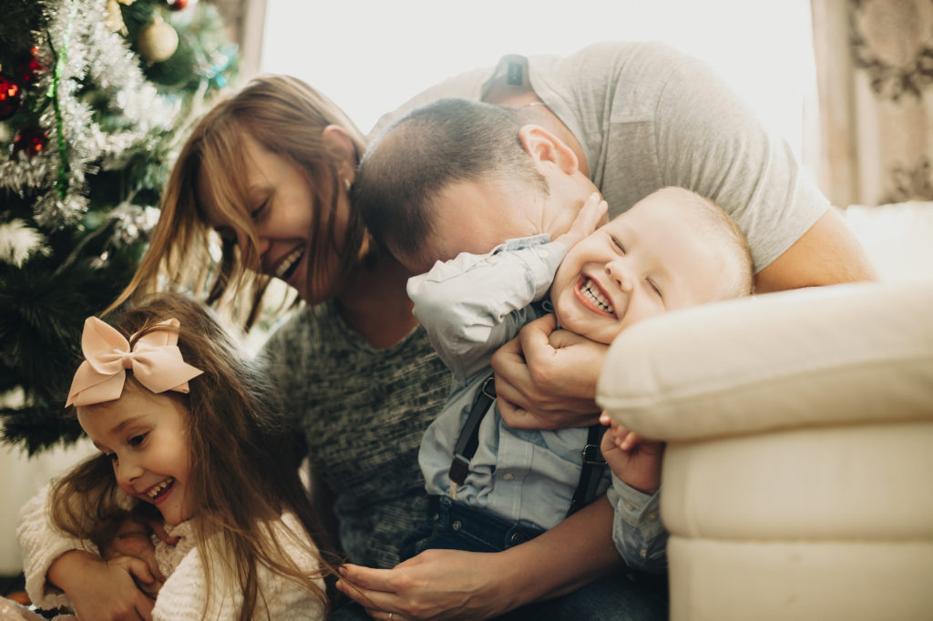 Embracing parents and kids at Christmas time