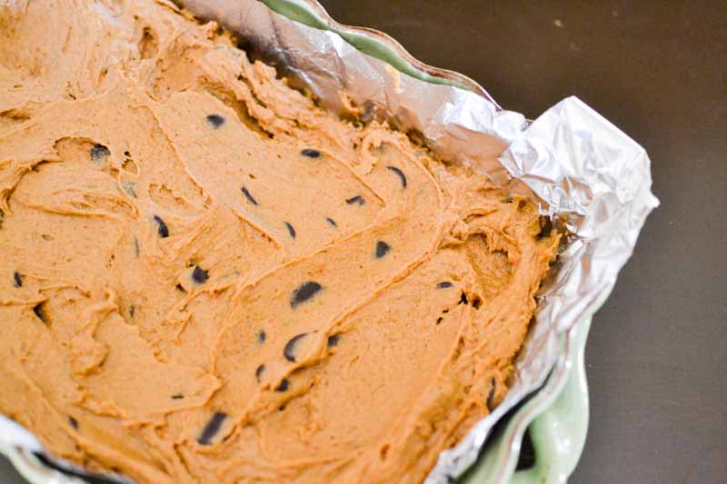 batter for pumpkin chocolate chip bars in baking pan